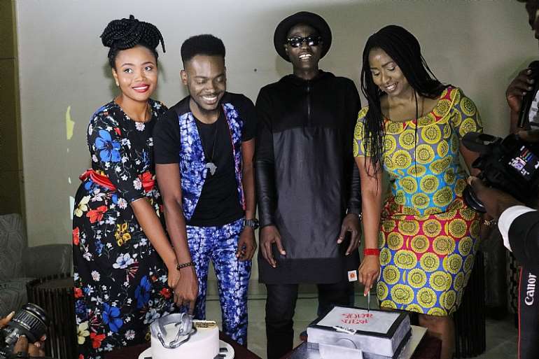 Cakes time with Adekunle Gold and YourView hosts.