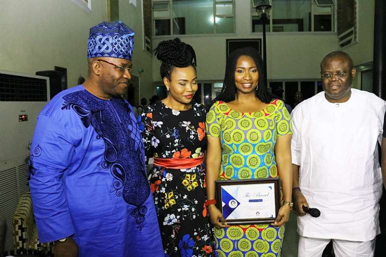 Presendting award of excellece to YourView hosts is Honourable Tunji Braimoh and senator Gbenga Obadara