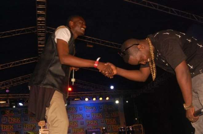 M.I bowing to XBUSTA on stage