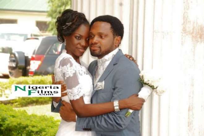 Cobhams Asuquo with his wife