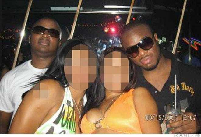 Tobechi Onwuhara (right) at a Dallas nightclub with Ezenwa Onyedebelu. Courtesy: FBI. 
