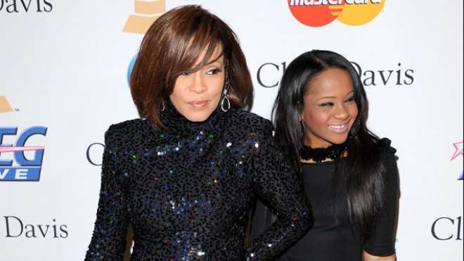 <b> Singer Whitney Houston and Bobbi Kristina Brown arrive at the 2011 Pre-GRAMMY Gala and Salute To Industry Icons Honoring David Geffen at Beverly Hilton on February 12, 2011 in Beverly Hills, California.</b>