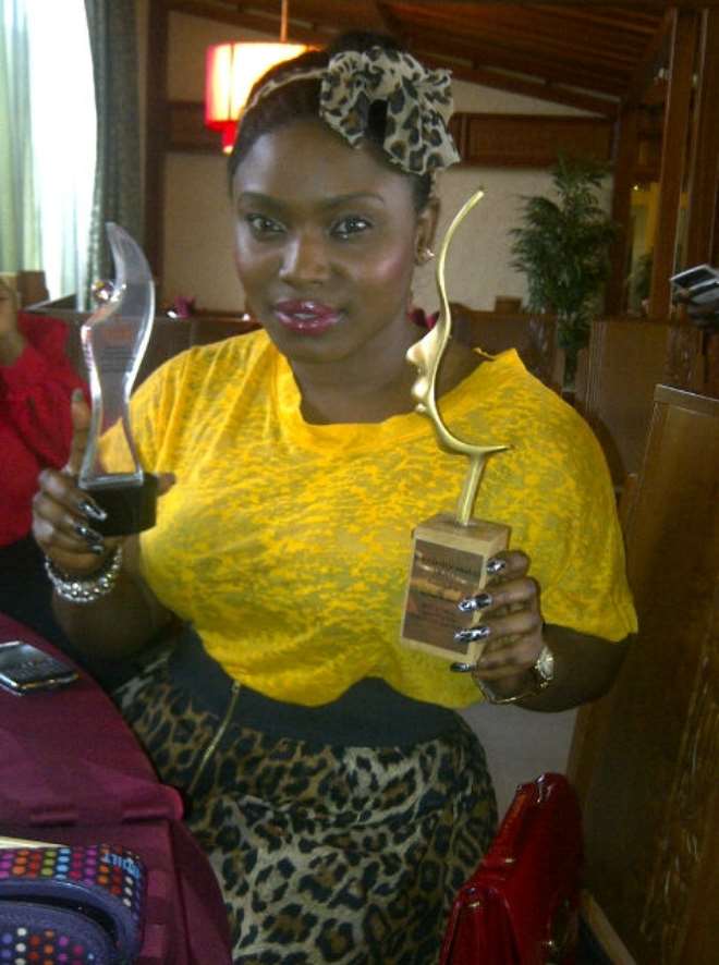 Halima poses with her awards