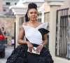 Actress, Omoni Oboli Causes Distraction at Movie Premiere